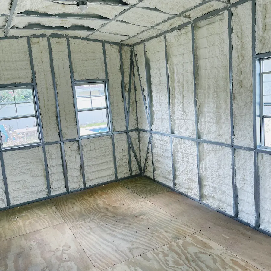 Closed-cell spray foam insulation applied to wall cavities in a residential project in Lake Wisconsin
